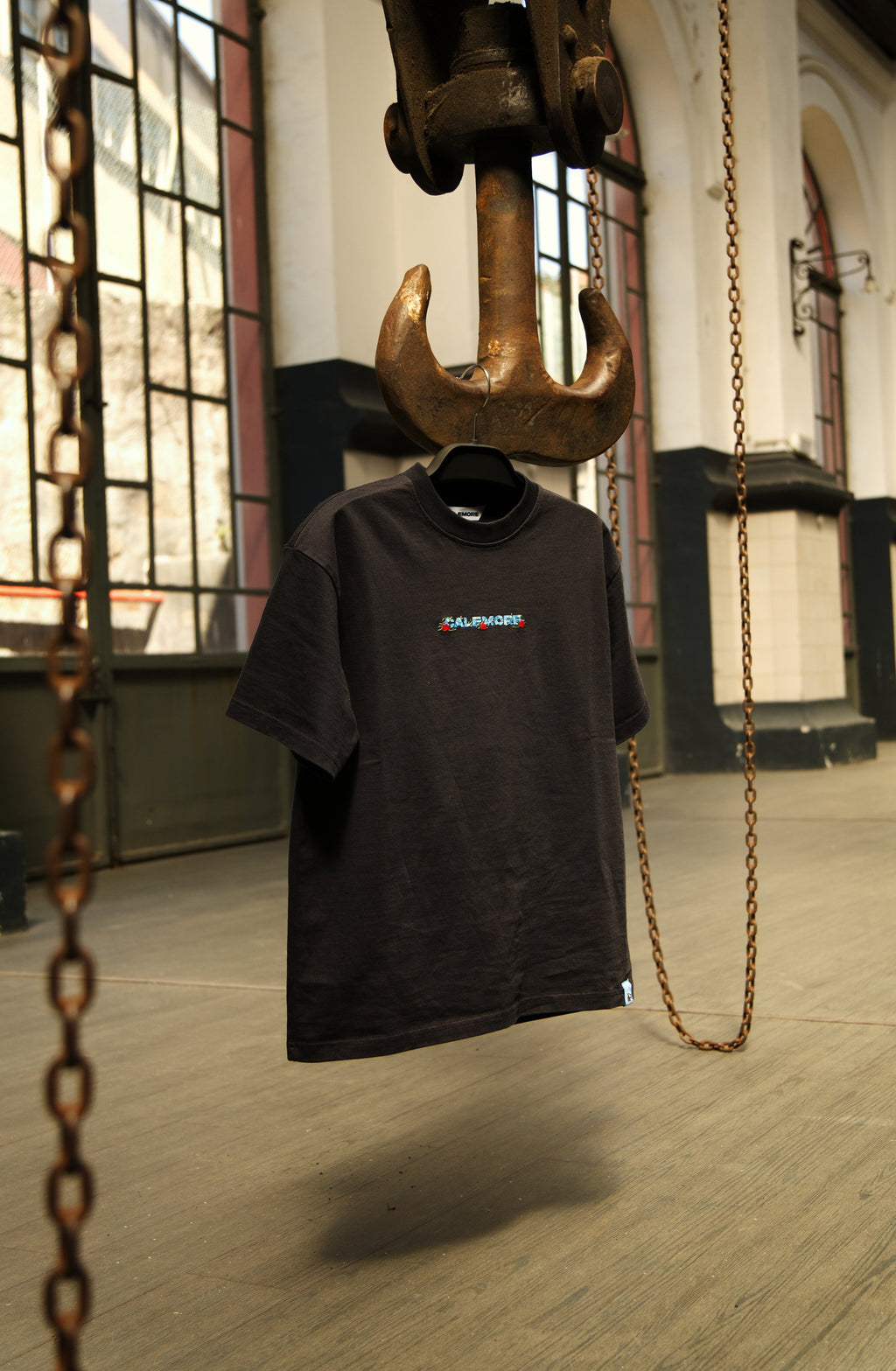 Invicta Tee, front, on a hook