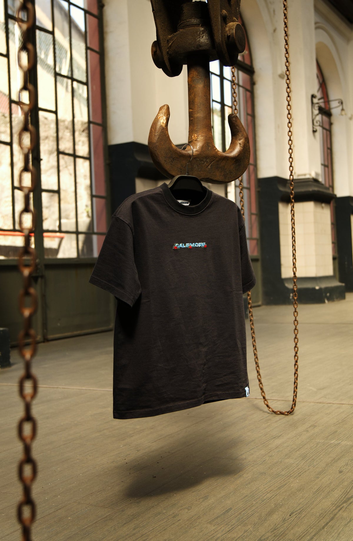 Invicta Tee, front, on a hook